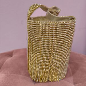 Bolso dorado con brillantitos y flecos